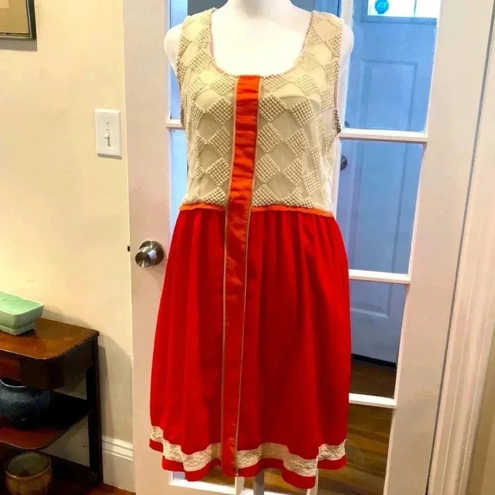 C. Luce sleeveless dress.